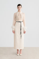 Textured wool-blend midi skirt with high waist and tailored silhouette for refined style